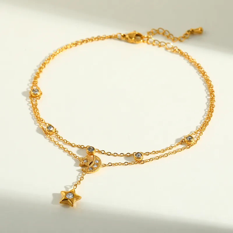 PULSERA CON DIJE COLGANTE LUNA ESTRELLA DORADO