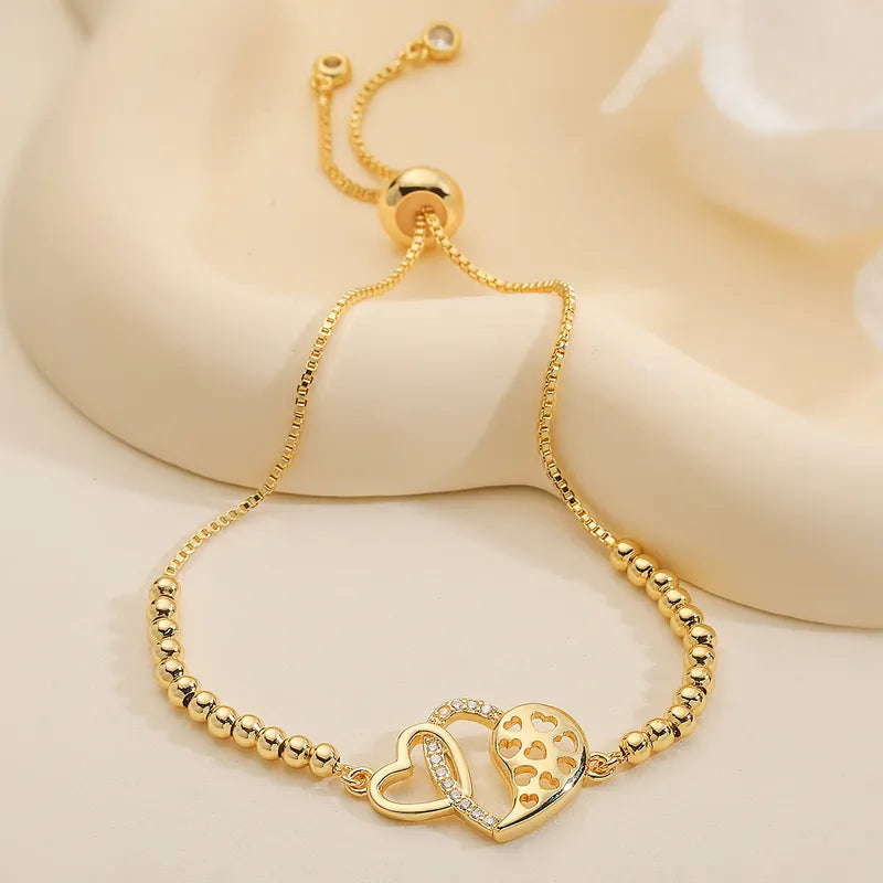 PULSERA AJUSTABLE CORAZONES DORADO