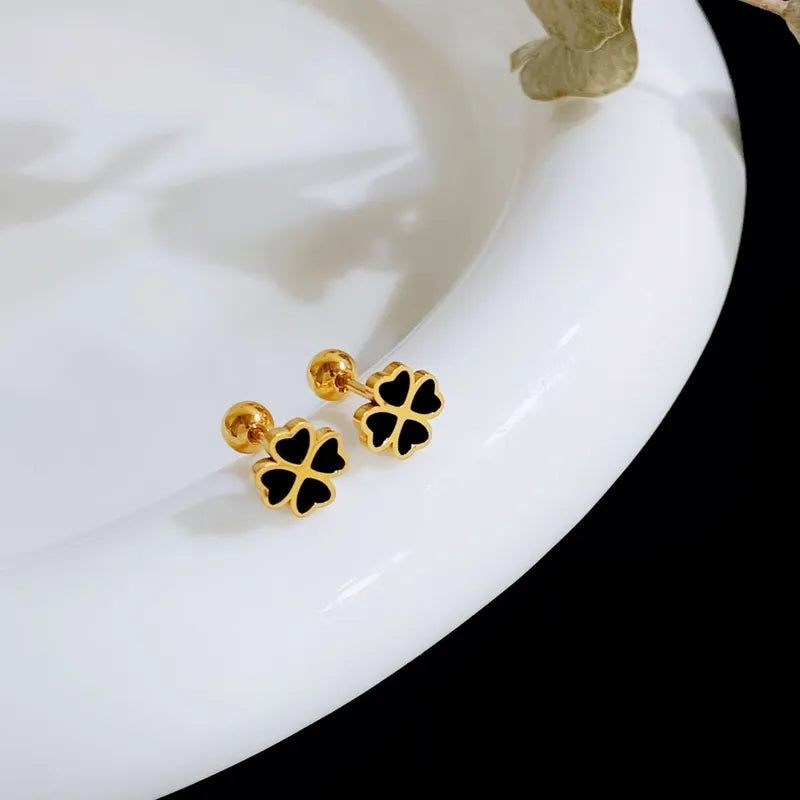 Aretes ortopedicos trebol negro