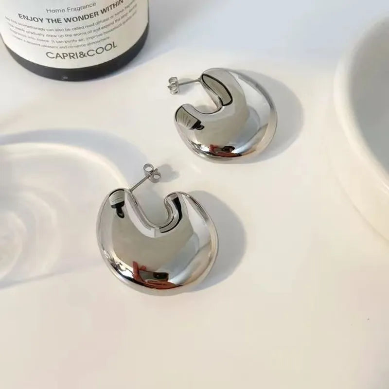 Aretes chunky en tendencia plateado