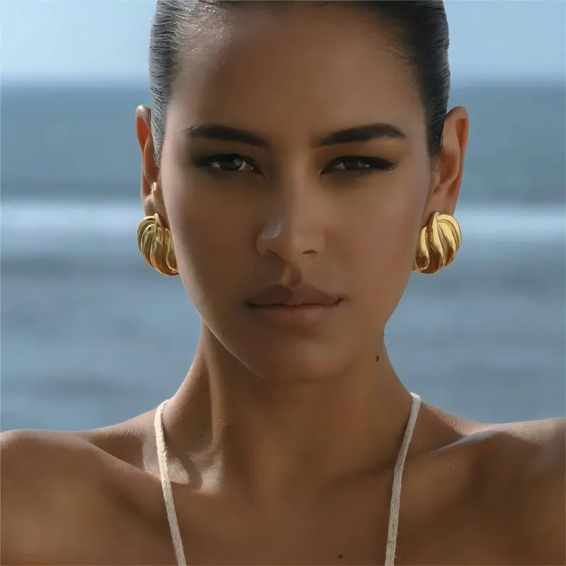 Aretes textura waves dorado