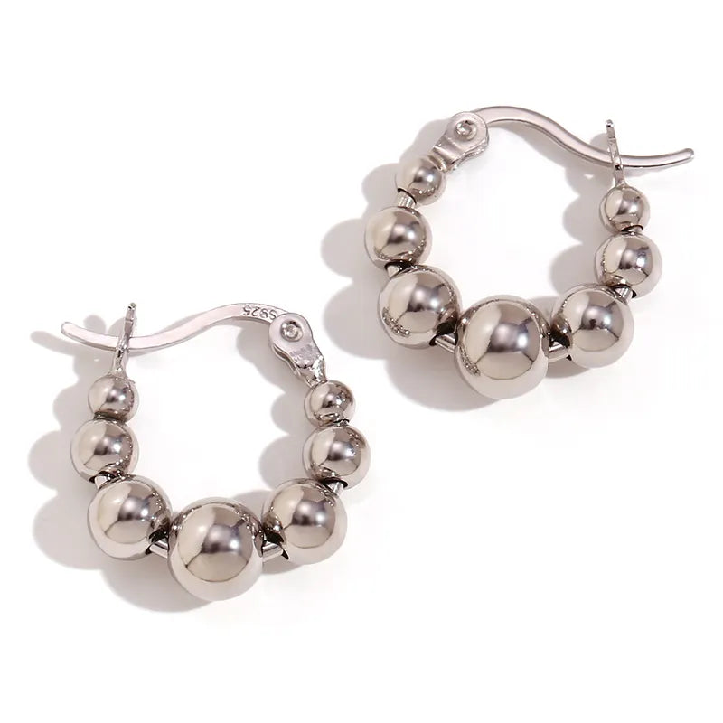Aretes balines plateado
