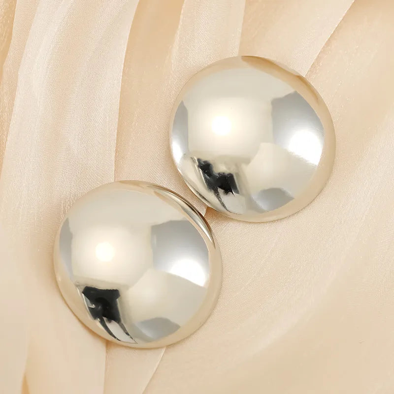 Aretes de tachuela lisos plateado