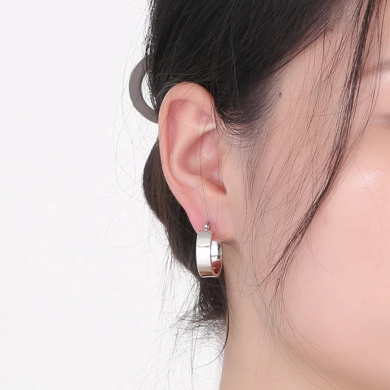 Aretes argollas anchas plateadas