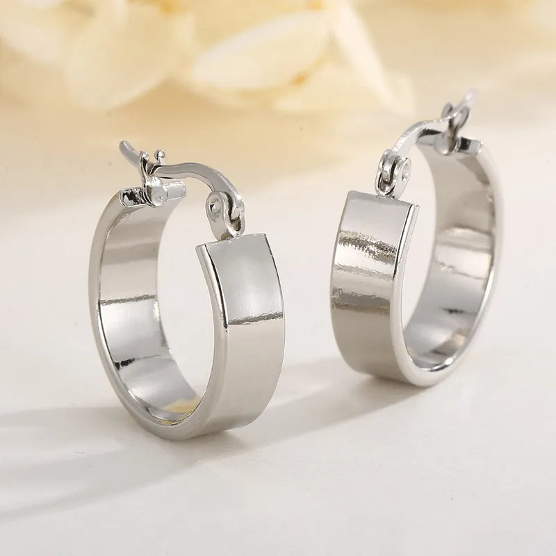 Aretes argollas anchas plateadas