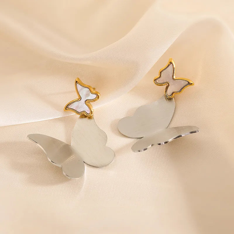 Aretes doble mariposa nacarada plateado