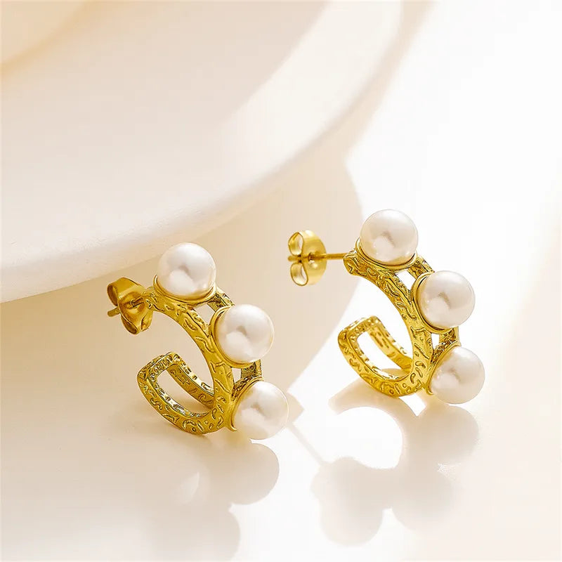 ARETES OVALO CON PERLAS DORADO