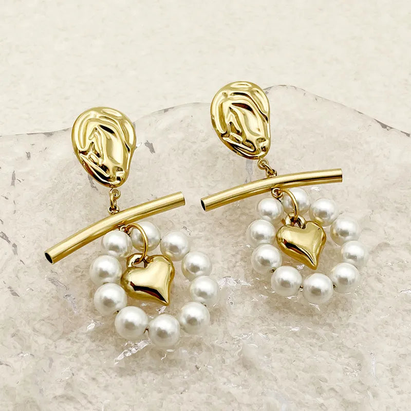 ARETES CORAZON CON PERLAS DORADO