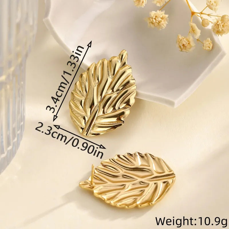 ARETES DE HOJA DORADO
