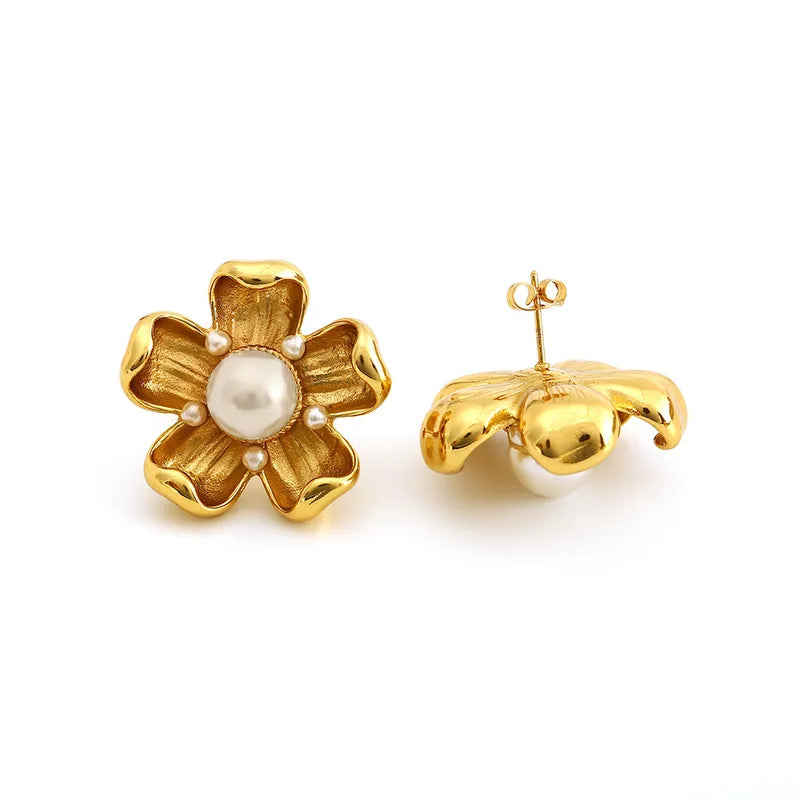 ARETES DE FLOR CON PERLA