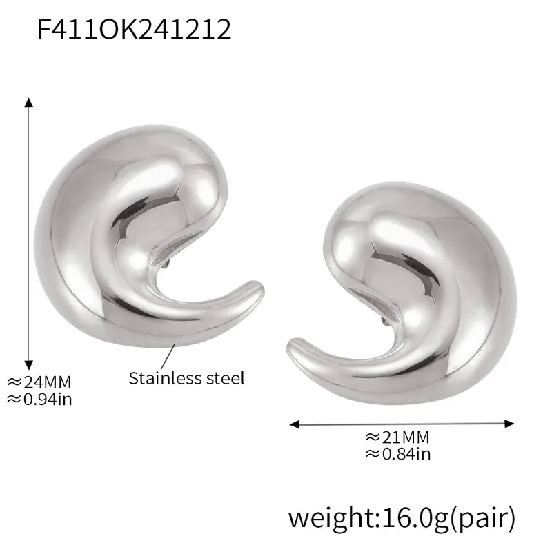 ARETES TIPO COMA PLATEADOS