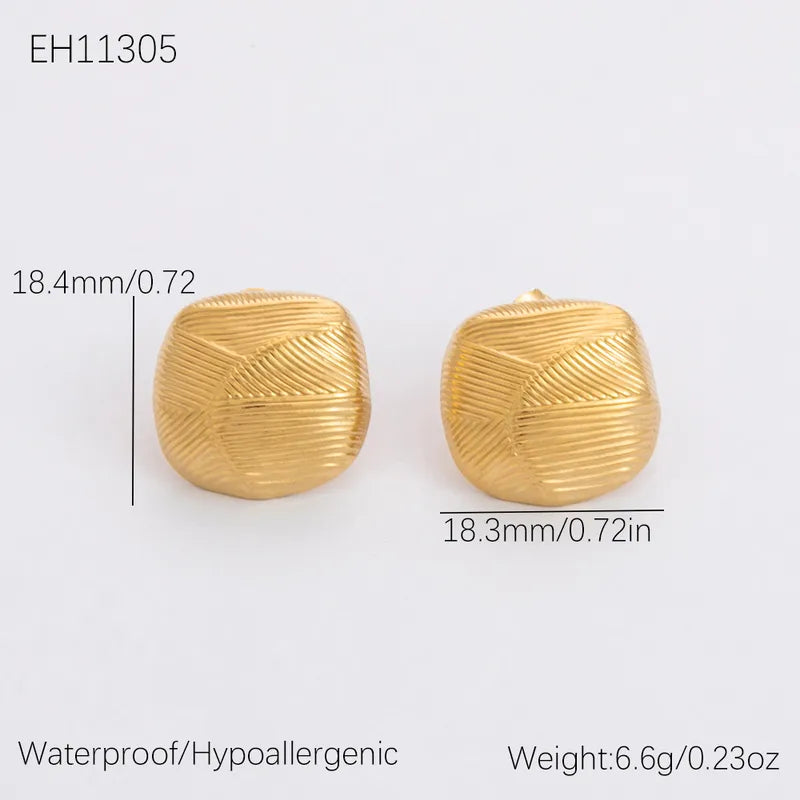 ARETES REDONDOS MEDIANOS CON TEXTURA