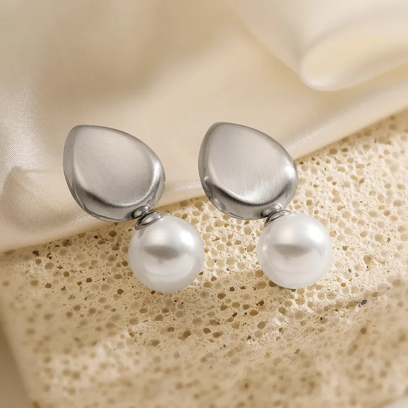 ARETES HOJA CON COLGANTE DE PERLA