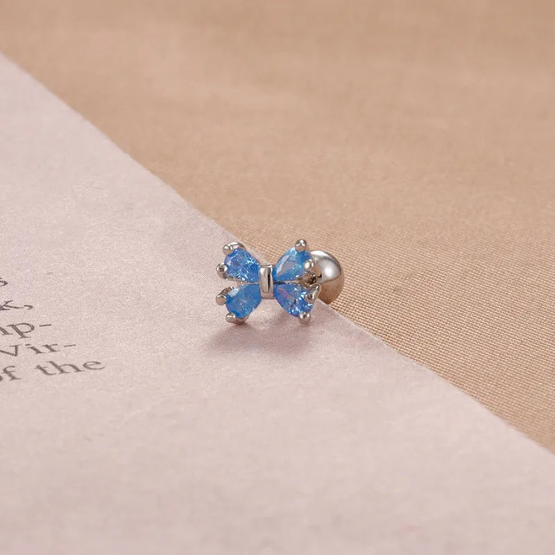 ARETES ORTOPEDICOS LAZON CON ZIRCON AZUL PLATEADO