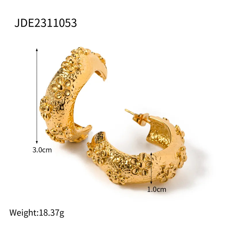 ARETES DE ARGOLLA CON TEXTURA FLORES 3D DORADO