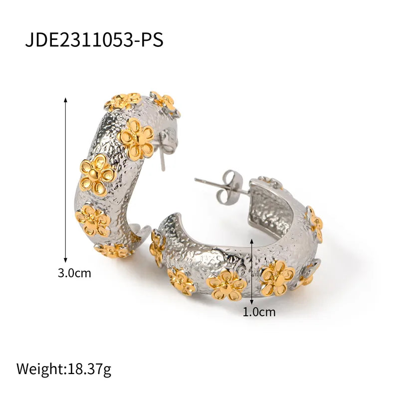 ARETES DE ARGOLLA CON TEXTURA Y FLORES 3D PLATEADO
