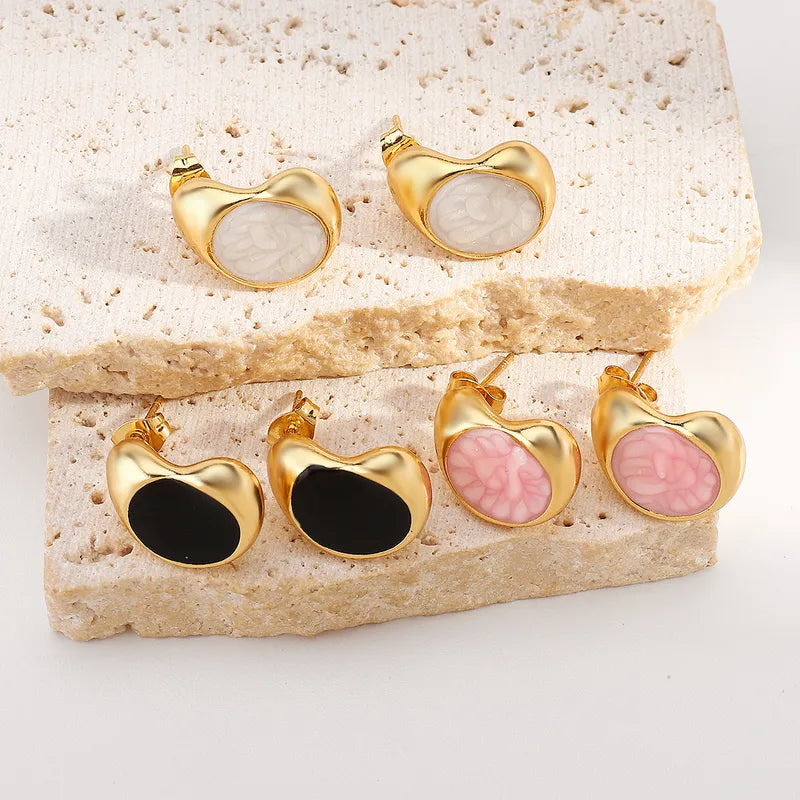 ARETES ALARGADOS NACARADOS BLANCO DORAOD