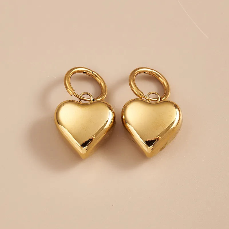 ARETES ARGOLLA CORAZON DIJE 3D DORADO