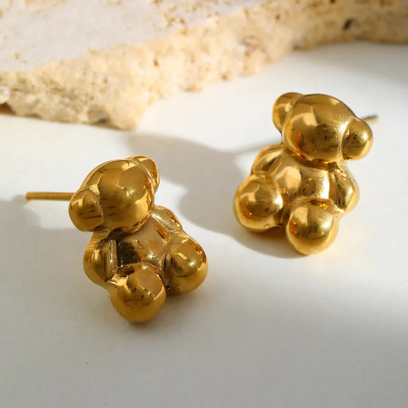 ARETES DE OSITO DORADO