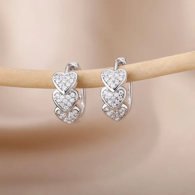 ARETES DE CORAZON ZIRCONES PLATEADO