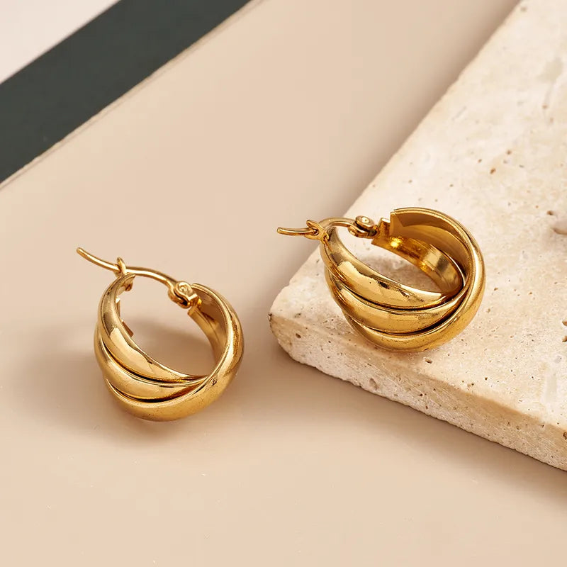 ARETES ARGOLLAS TRIPLES DORADO