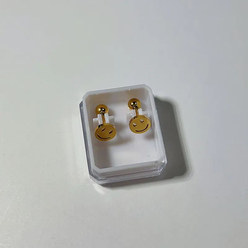 ARETES ORTOPEDICOS CARA FELIZ DORADO