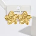 ARETES DE FLOR GRANDES DORADO