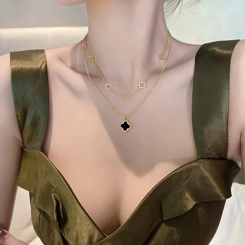 LAYER DOBLE DE TREBOL NEGRO CON DORADO