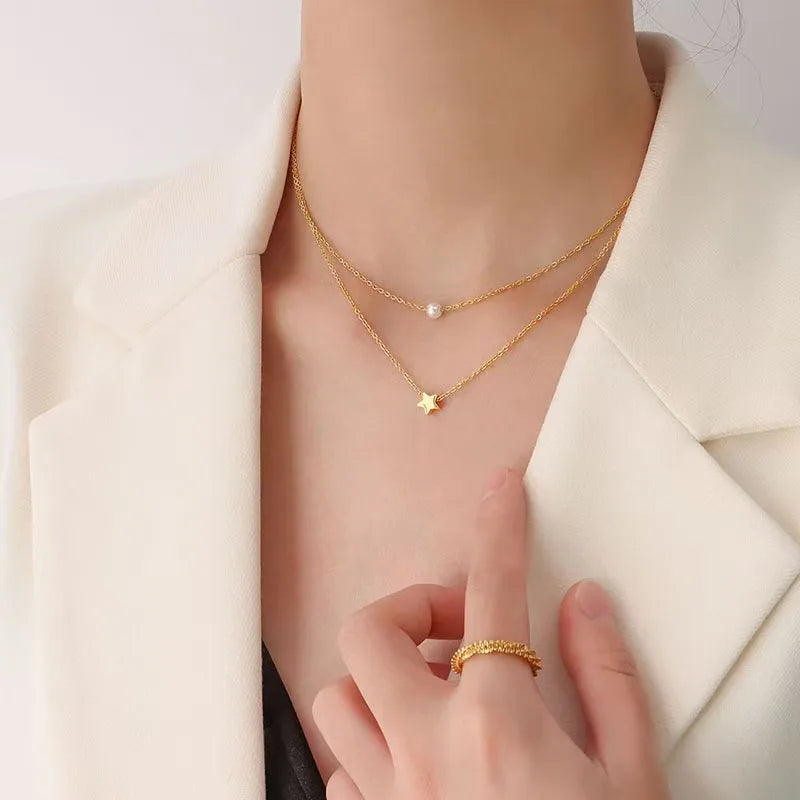LAYER DOBLE DE PERLA CON ESTRELLA DORADO