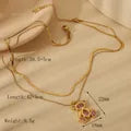 Layer doble de oso con zircones dorado