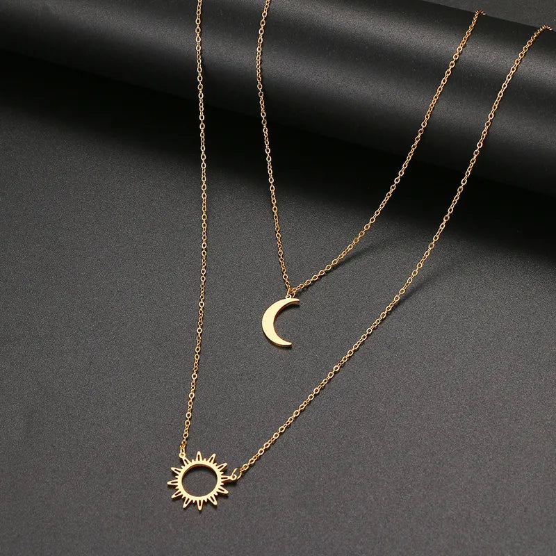 LAYER DOBLE DE SOL Y LUNA DORADO