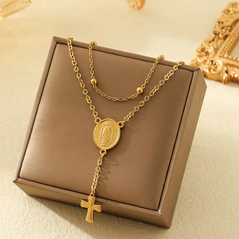 LAYER DOBLE DE CRUZ CON DIJE DORADO