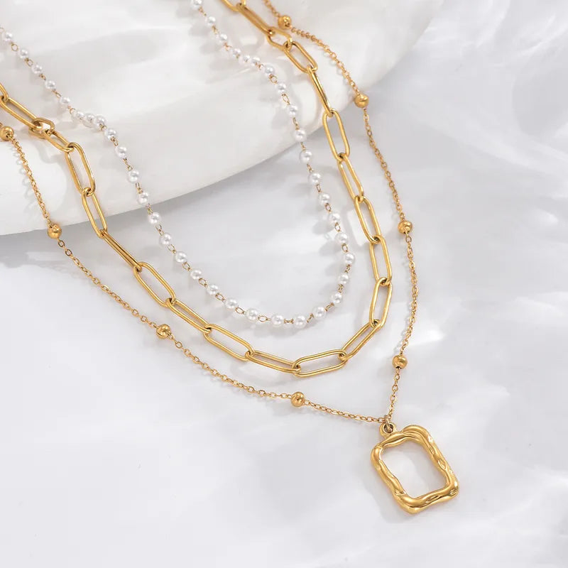 LAYER TRIPLE CON PATRONES BASICOS PERLAS-DORADO
