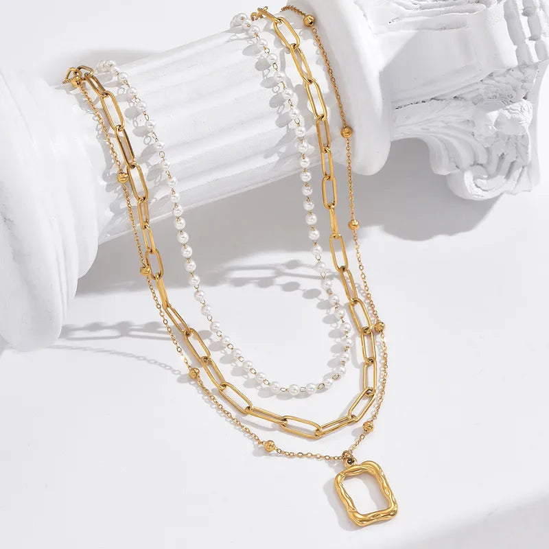 LAYER TRIPLE CON PATRONES BASICOS PERLAS-DORADO