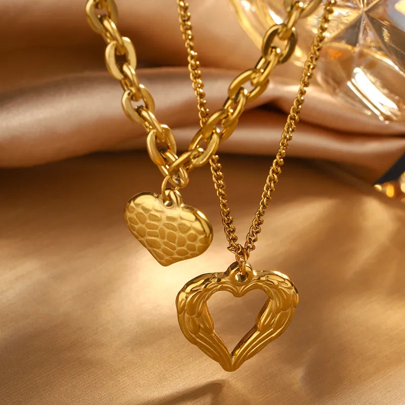 LAYER DOBLE DE ESLABONES CON CORAZONES DORADO