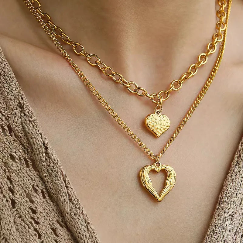 LAYER DOBLE DE ESLABONES CON CORAZONES DORADO