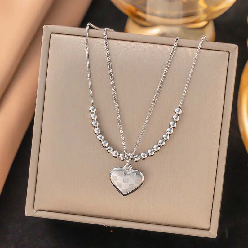 LAYER DOBLE DE CORAZON CON BALINES PLATEADO