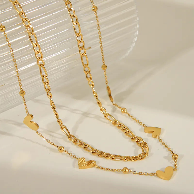 LAYER DOBLE ESLABONES CORAZON DORADO