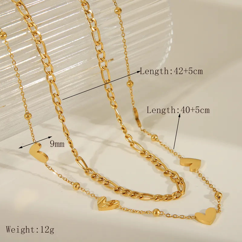 LAYER DOBLE ESLABONES CORAZON DORADO