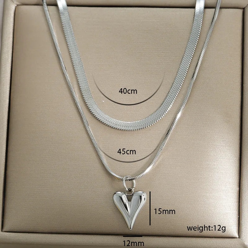LAYER TRIPLE DE CORAZON SNAKEBONE PLATEADO