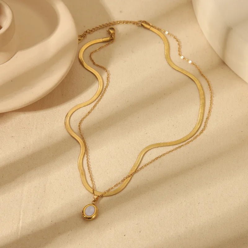 LAYER DOBLE SNAKEBONE OVALO DORADO