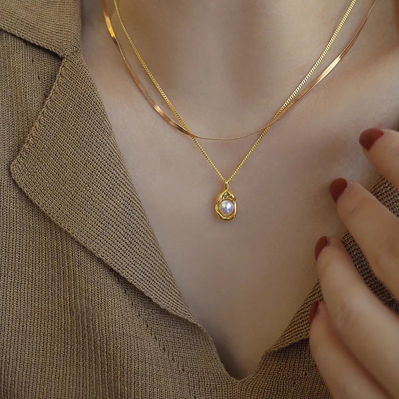 LAYER DOLE CON PERLA SNAKEBONE DORADO