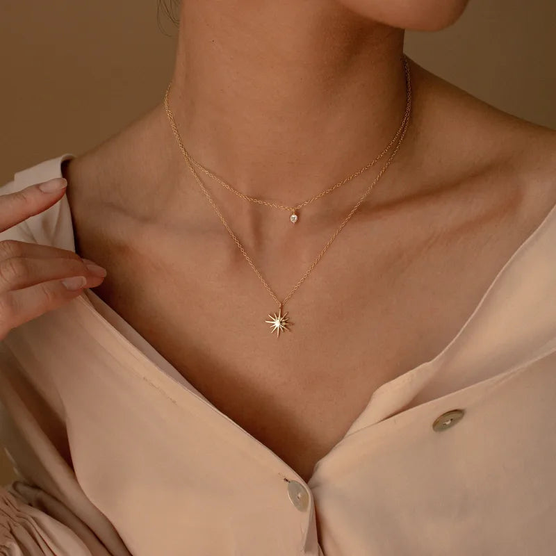 LAYER DOBLE ESTRELLA ZIRCONES DORADO