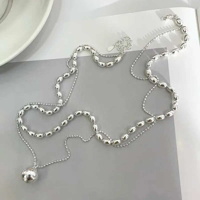 LAYER DOBLE CON PERLAS PLATEADAS