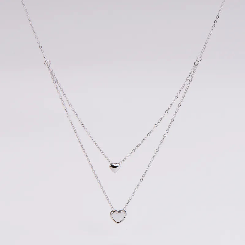 LAYER DOBLE MINI CORAZON PLATEADO