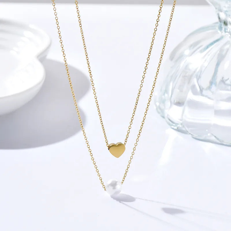 LAYER DOBLE CON DIJE DE CORAZON Y PERLA