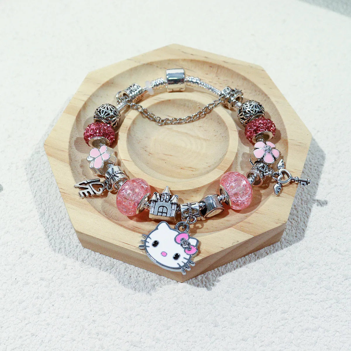 PANDORA HELLO KITTY ROSA CON CHARMS PLATEADO