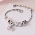PANDORA CON LAZO ROSA PLATEADO