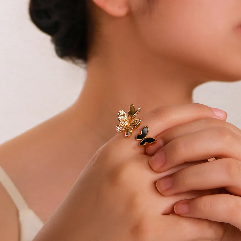 Anillo varias mariposas negra dorado