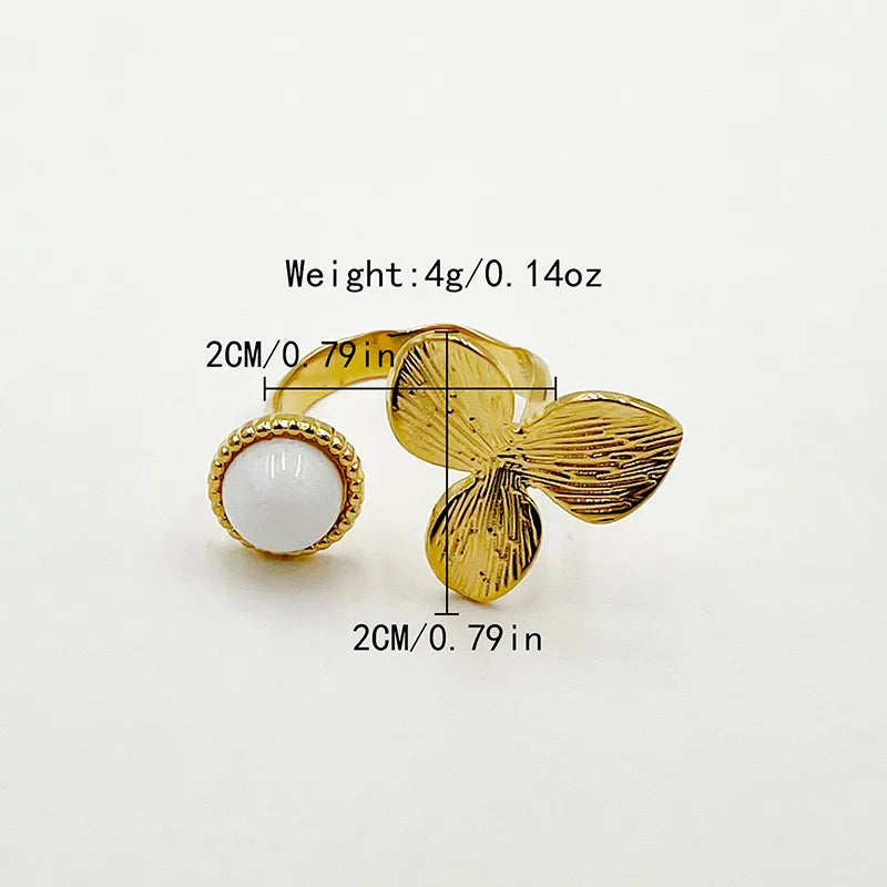 ANILLO DE FLOR CON PERLA DORADO